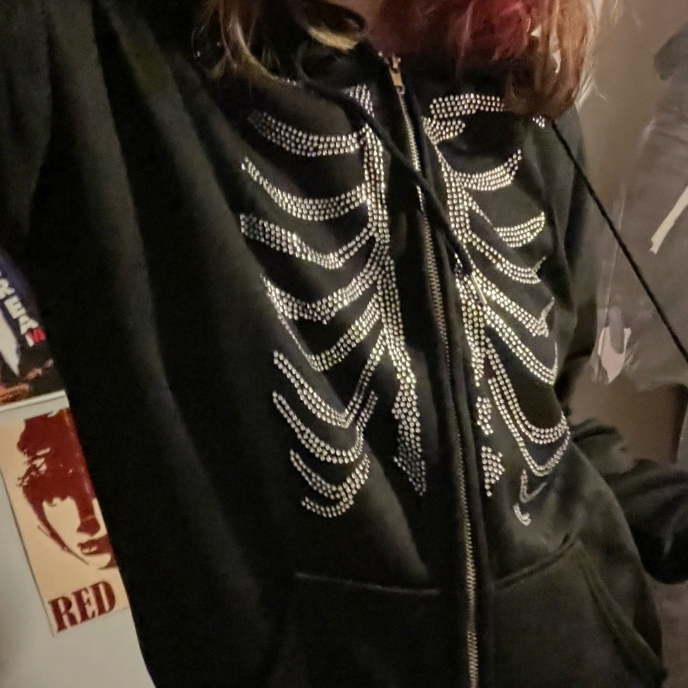 the cutest rhinestone skeleton jacket in large !! (it fits more like a medium)